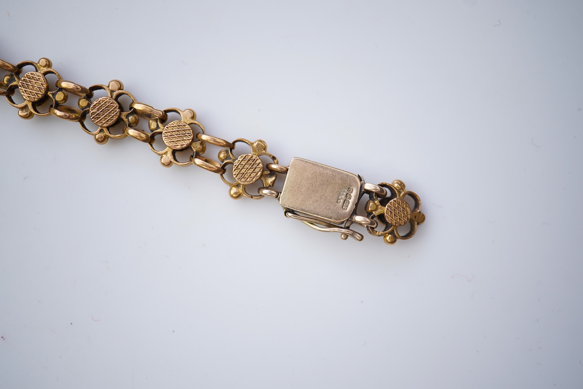 A gold bracelet, circa 1990